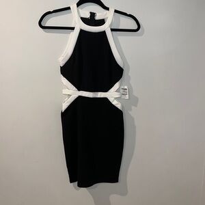 NWT form fitting black dress with side cut outs